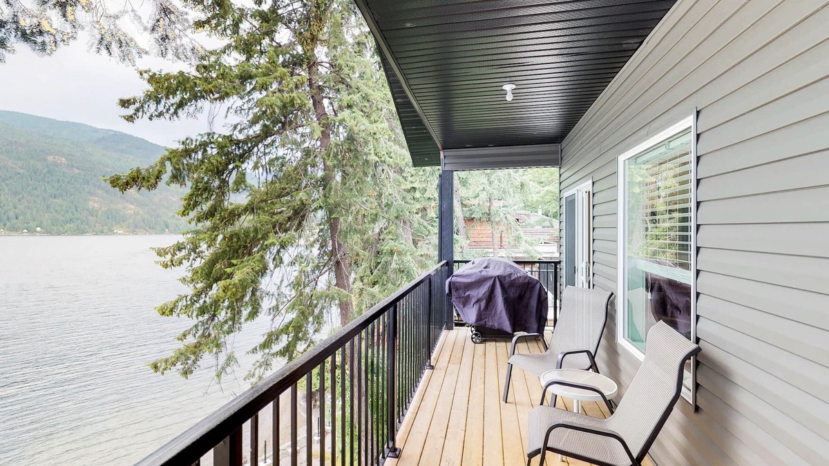 Christina Lake House | Lakeside Home with Peaceful Location, Lovely Views, Private Beach & Dock