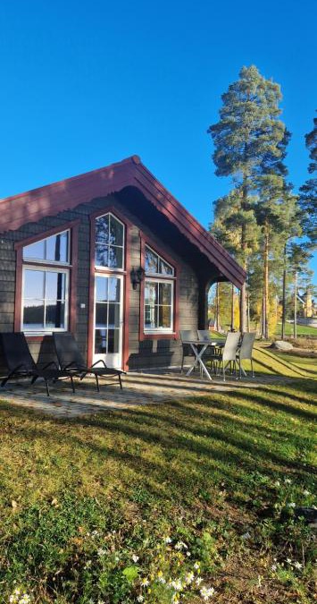 Falun House | Lakeside log cabin Främby Udde Falun