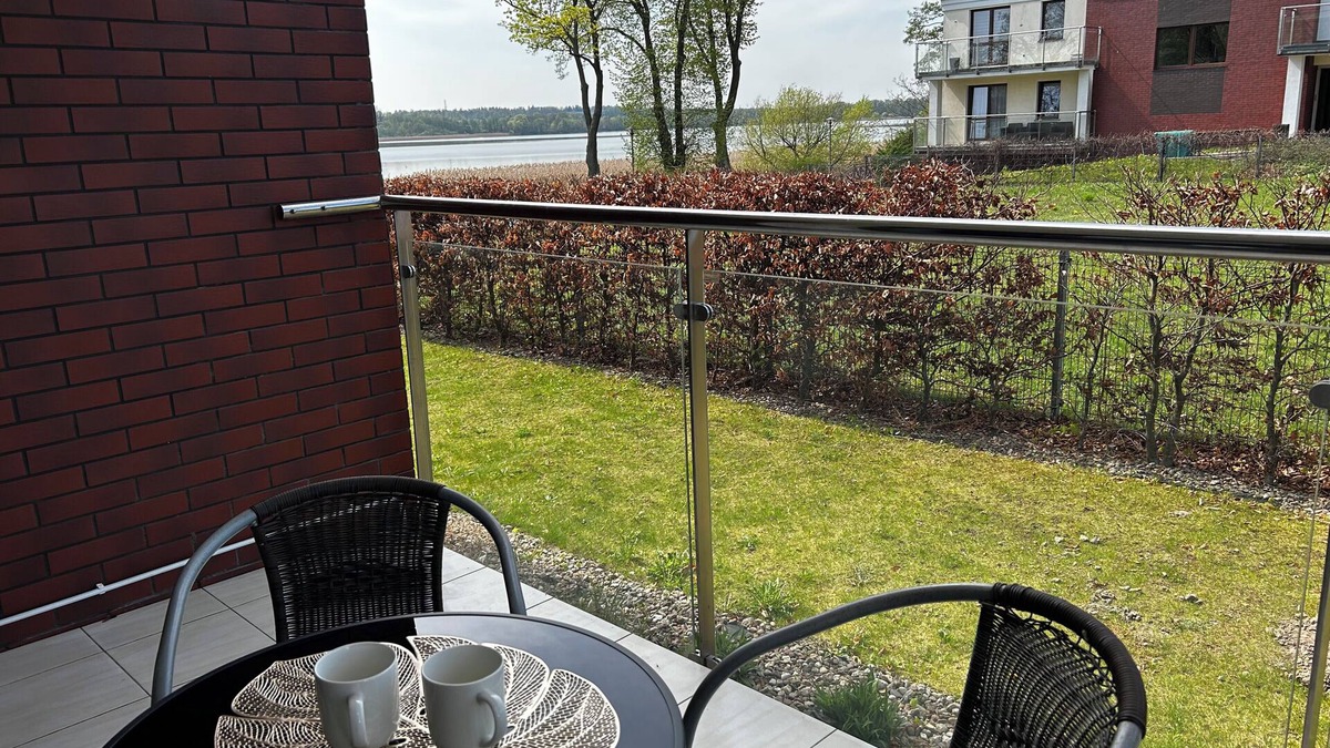 Ostroda Apartment | Lakeside Promenade View Sunset Studio