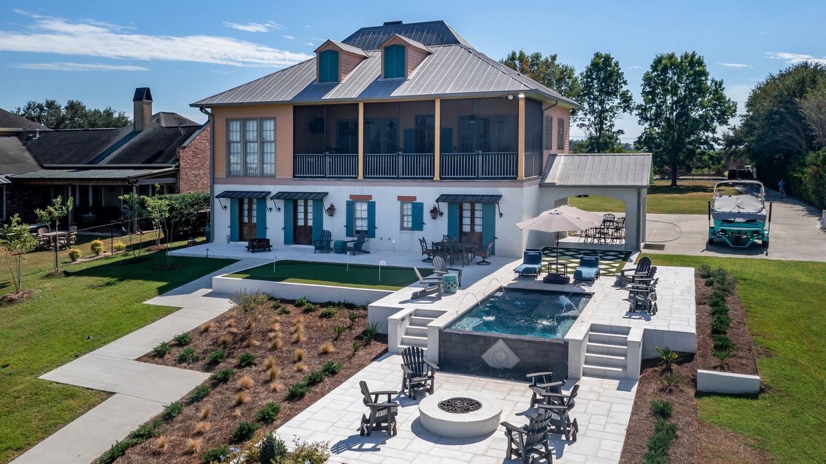 Livonia House | Large Beautiful Home On False River w/Pickleball Court and Heated Cocktail Pool