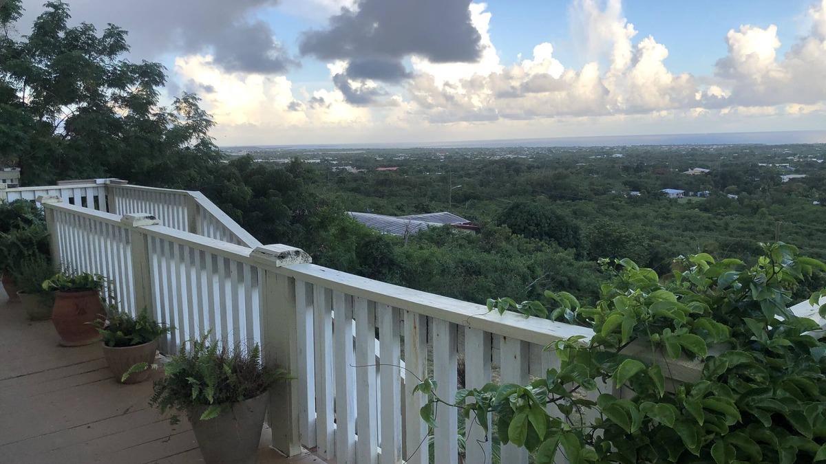 Estate Whim House | Large hillside one bedroom apartment with a sea view.