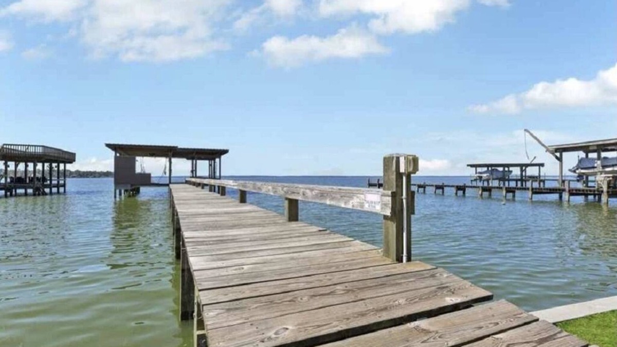 West Livingston House | Large Home With Boat Dock and Picture Perfect Sunsets Sleeps 14
