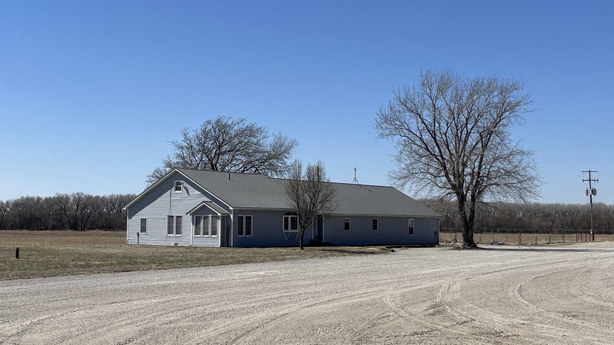 Republic County House | Large house surrounded by farm land along the Republican River.