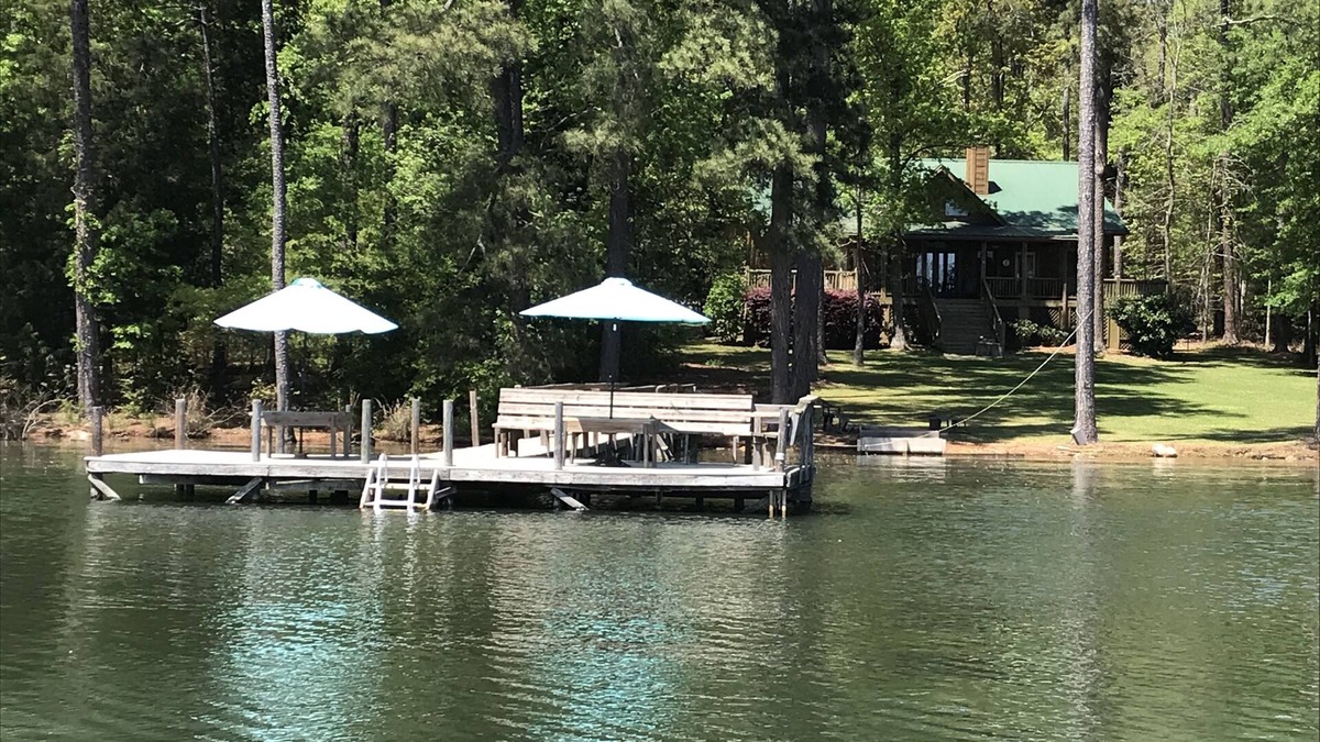 Gilbert House | Large Log Cottage: Green Grass, Blue Skies, Lake Living