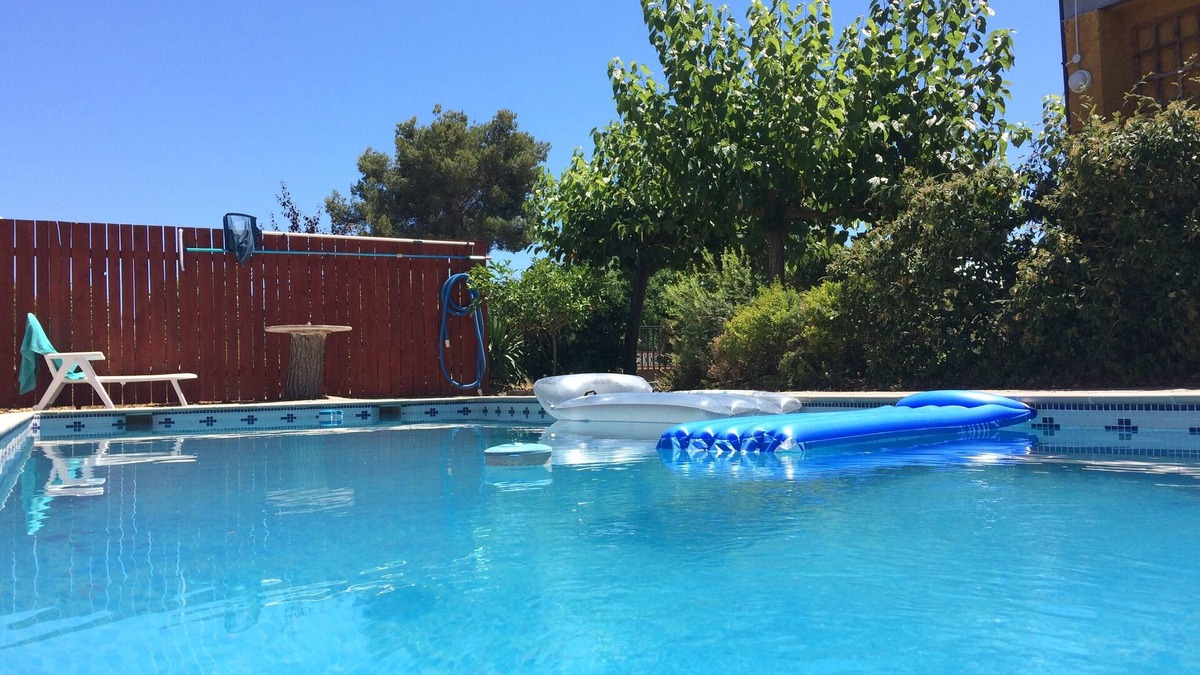 El Catllar Apartment | Large private pool, entire new build cool airy flat, gardens, parking, WiFi