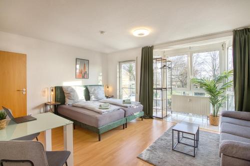 Stadtbezirk Ost Apartment | Larooms - Sonne#1, STUDIO mit Parkplatz in ruhiger Lage und perfekter Anbindung