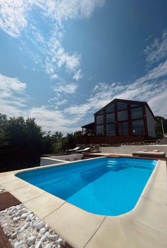 Sisesti Ski Chalet | Le Chalet M - Cabană cu o panoramă de poveste.