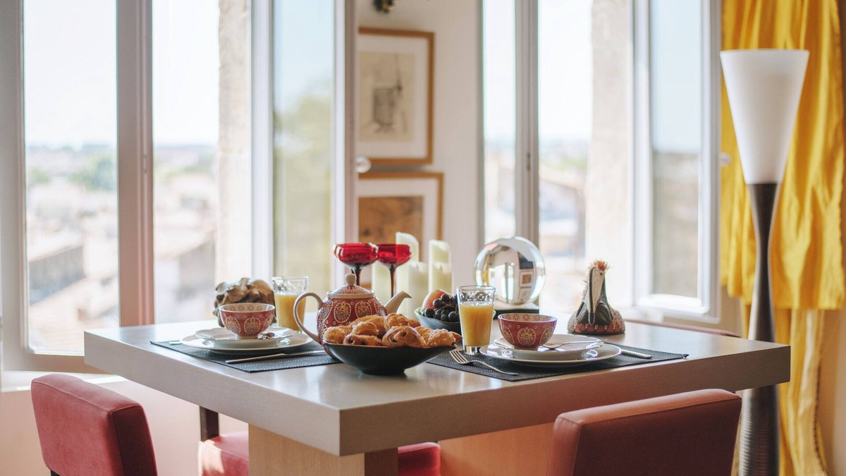 Montpellier City-Centre Apartment | Le Nid Exotique: views over the rooftops of the city center