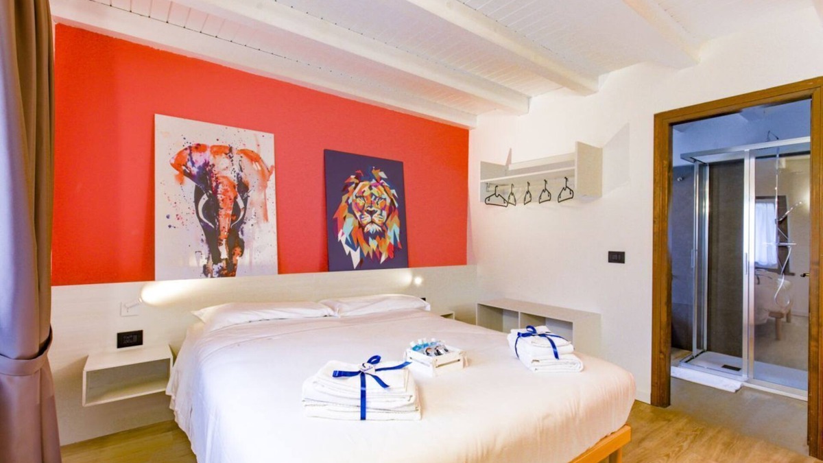 Belluno Apartment | LE TOFANE - Room CICLAMINO