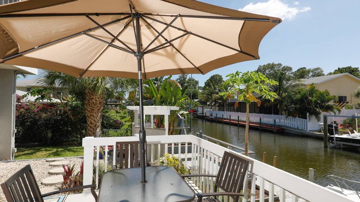 Grove City Condo | Lemon Bay Waterfront Condo w Patio, 5 miles to Gulf Beaches