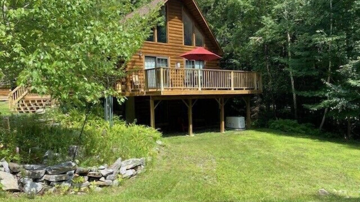 Kents Hill House | Light-Filled Log Home, 4 Wooded Acres, & Lake Access. The water is 0.4 mi away.