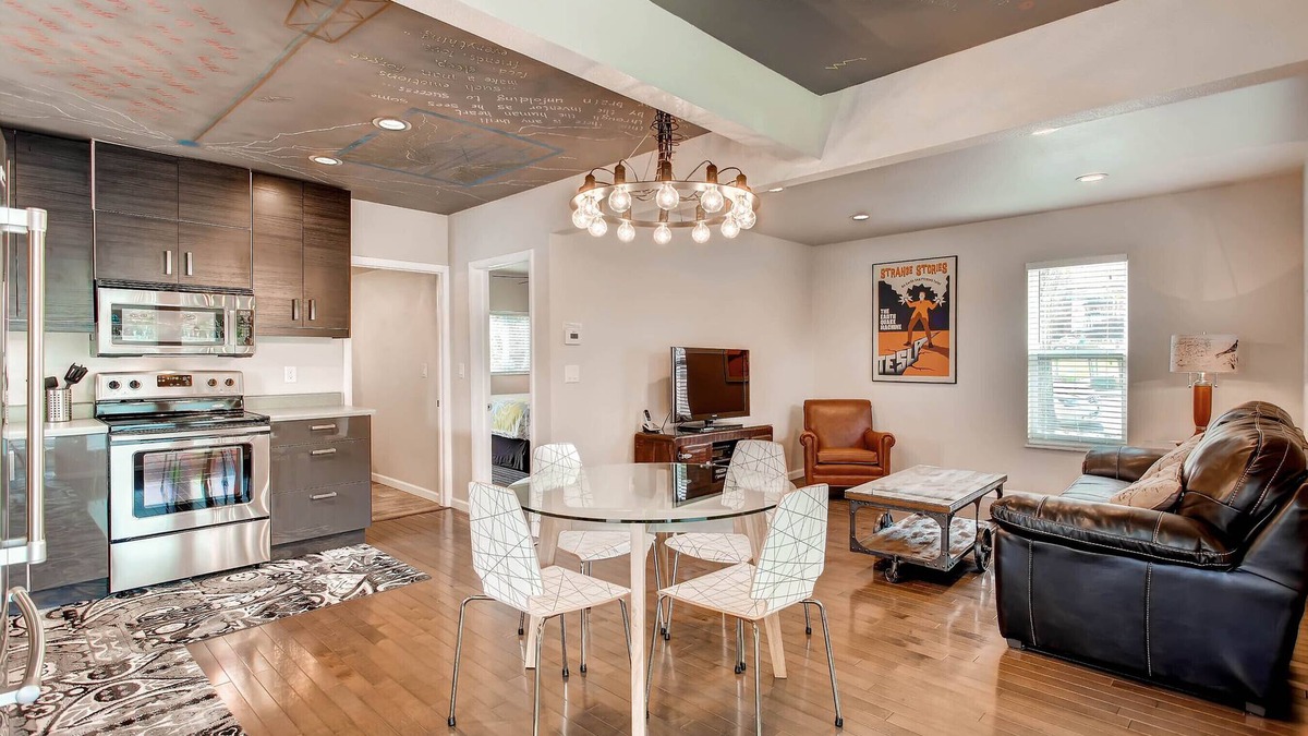 Colorado Springs House | Lightning Laboratory — electricity decor, mural ceiling, secret patio, W/D