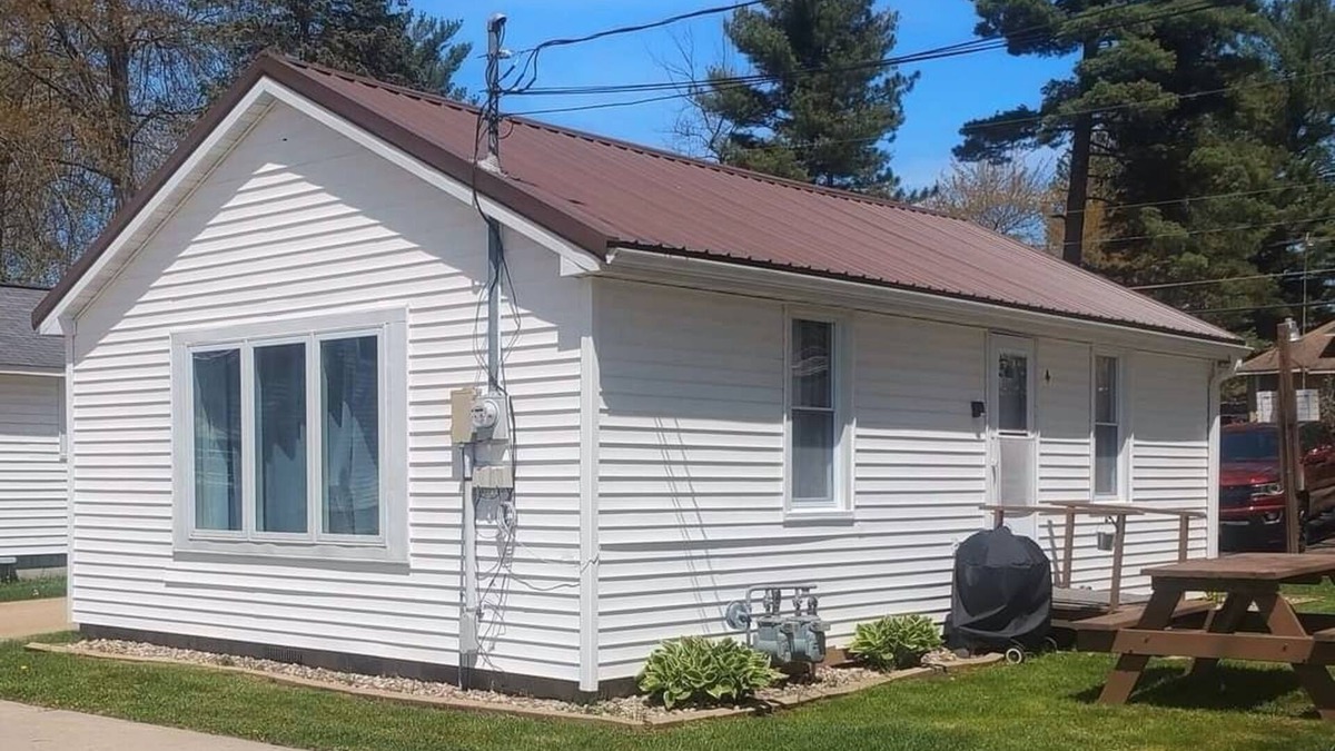 Shawano Cottage | Lilly Pad North, Cottage #4 is on Shawano Lake, nestled among 4 other cottages. Beautifully located. Relaxing days on the beach and sunsets by the firepit are the best.