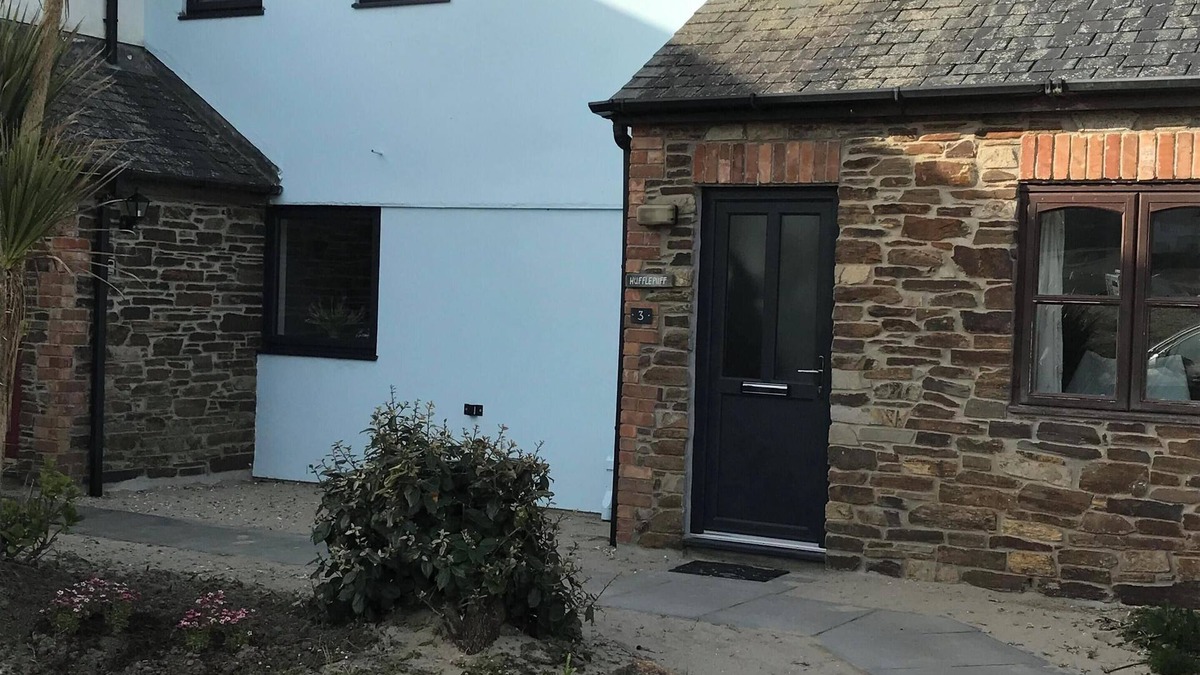 Porthtowan House | Located 60m from beach and situated opposite the sand dunes. Loved by families.