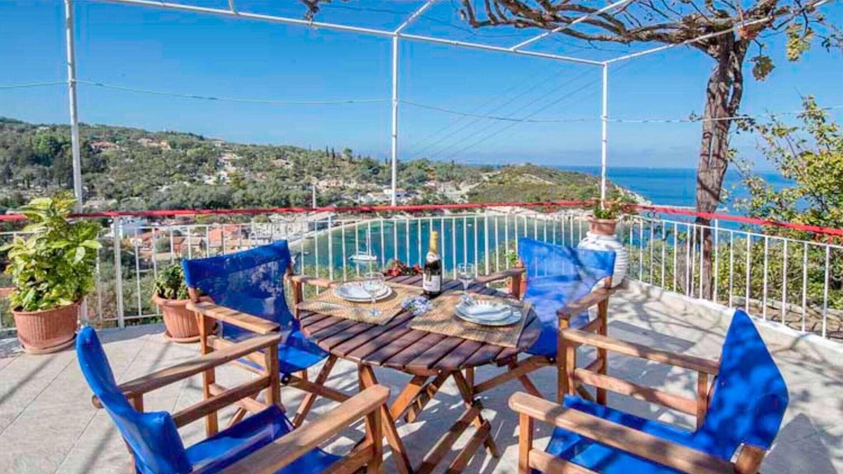 Longos Apartment | Located in the most enviable position, with uninterrupted views of Loggos Harbour and the sea, sits