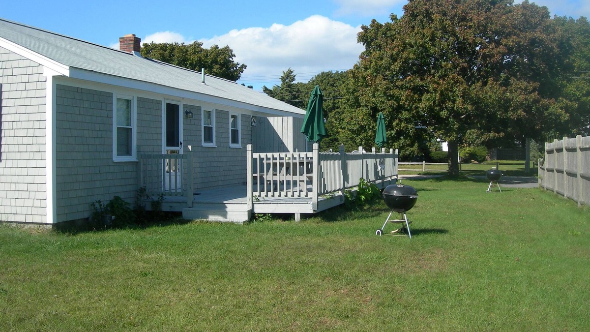 Falmouth Condo | Location, Location! New listing Steps to Surf Drive Beach, sleeps 5,deck, yard