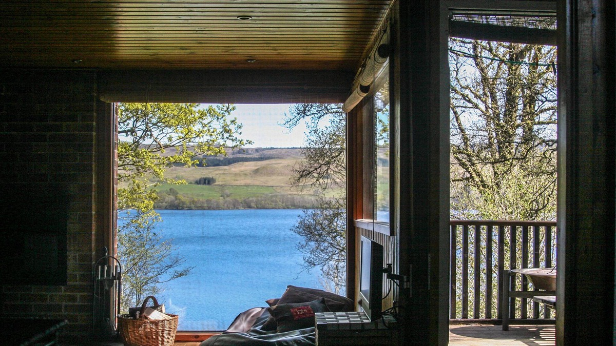 Lerags Ski Chalet | Lochside Chalet With Fireplace, Fantastic Mountain And Lake Views and Fishing.