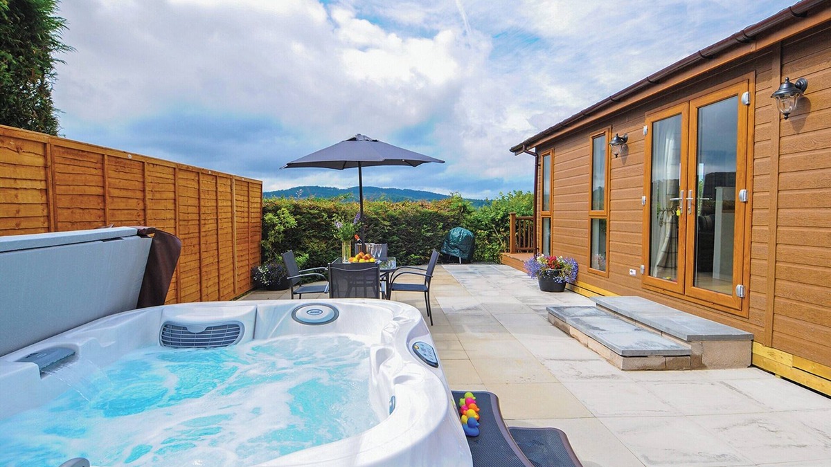Low Newton Ski Chalet | Lodge with one king-size double with TV.