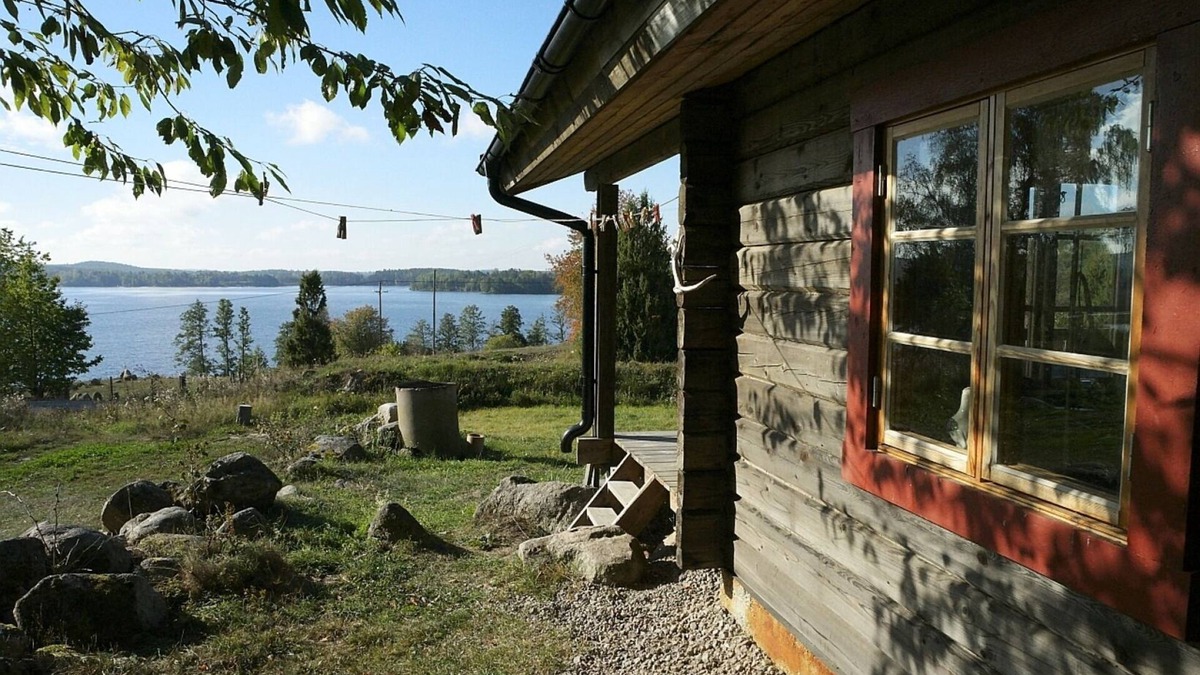 Horn House | Log cabin close to nature with a fantastic lake view