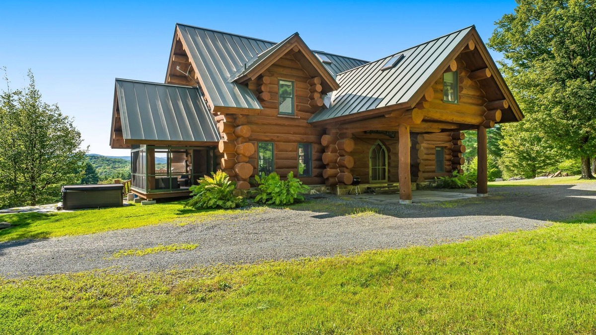Hartland Four Corners House | Log manor on 65 private acres of land with entertaining amenities & hot tub