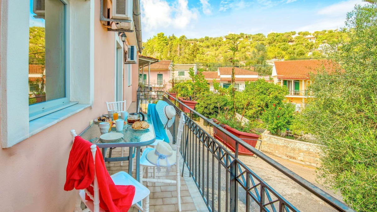 Longos Apartment | Loggos Haven: Chrisoula's upper-floor escape. Modern comforts, short walk to beaches.