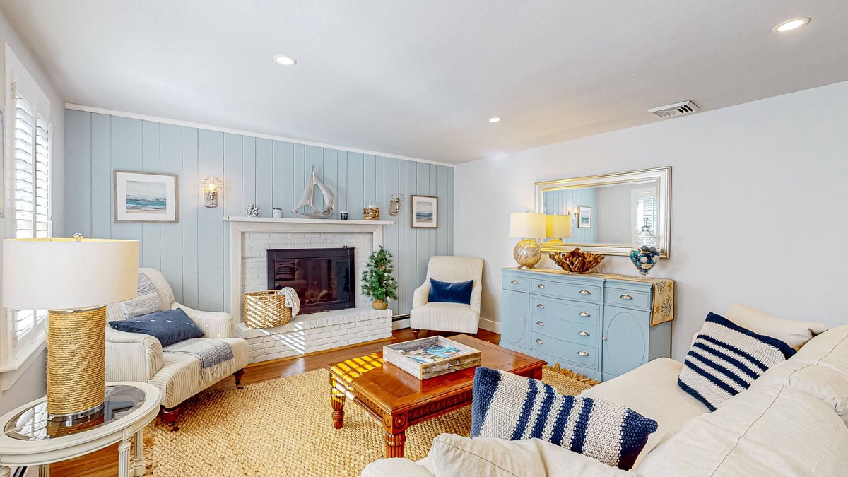 Cotuit House | Lovell's Pond Retreat - remodeled home with sunroom, steps to secluded pond
