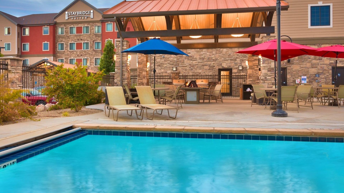 Midvale Condo | Lovely King Suite | Access to a Heated Pool & Hot Tub. Free Breakfast Buffet. Near Jordan Landing!