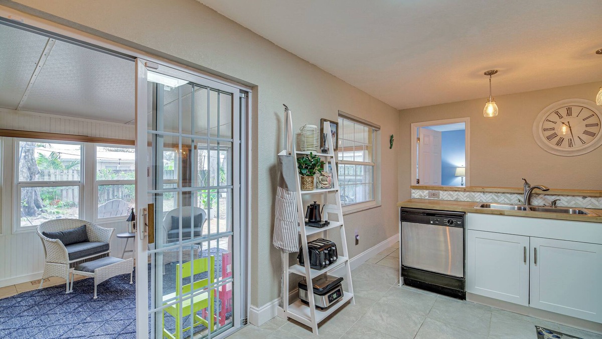 Surfside Estates Cottage | Lovely Merritt Island Home w/Kayak + Fire Pit!
