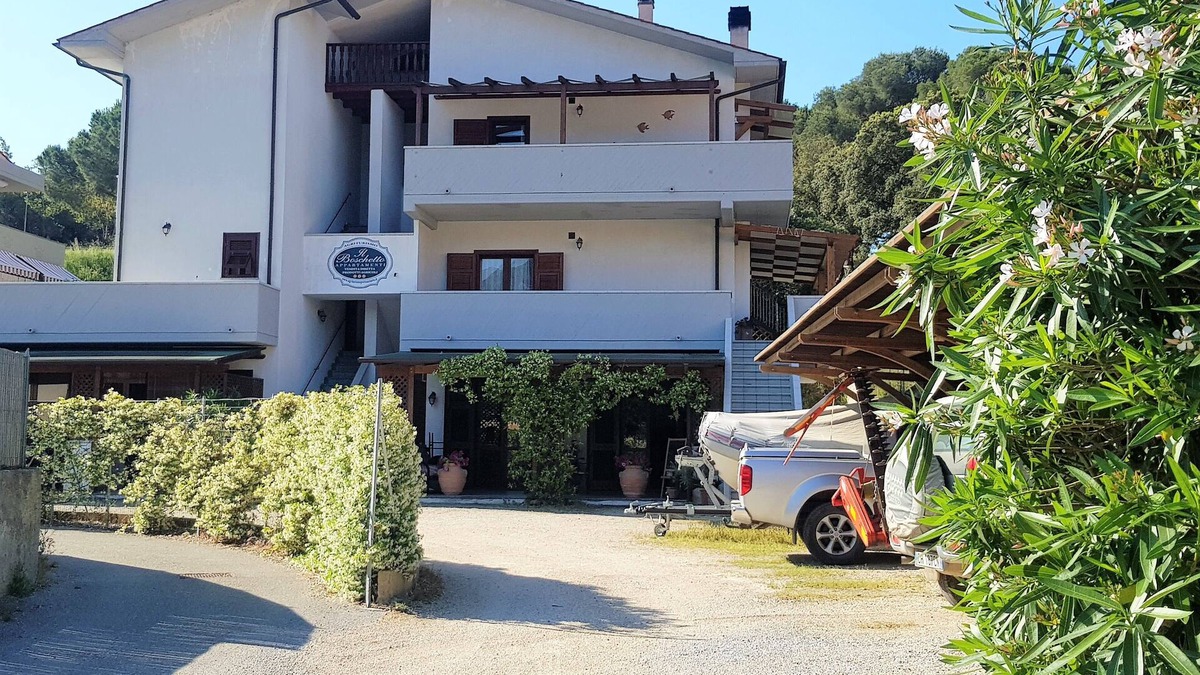 Porto Azzurro Apartment | Lovely one-bedroom apartment with terrace and parking space a few steps from the center