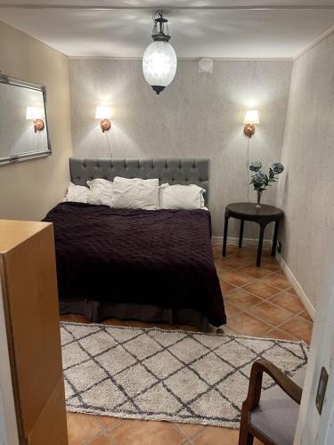 Bastad House | Lovely small room with a double bed no window in a charming Båstad villa prime location with terrace