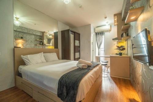 Jatinegara Apartment | Lovely Studio at Bassura City Netflix and chill
