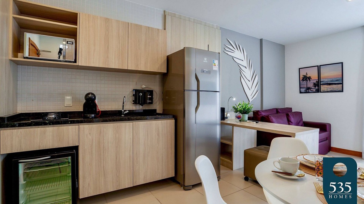 Caminho das Arvores Apartment | Lovely Suite Compact Kitchen in Central Region