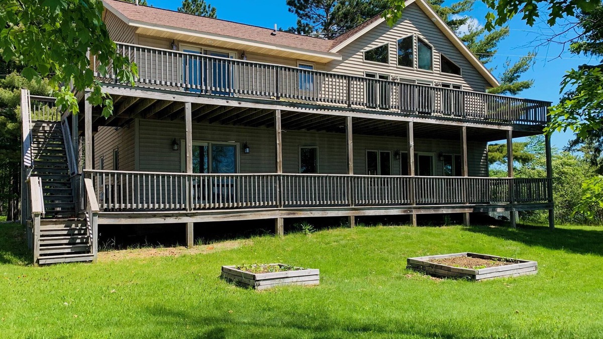 Tomahawk House | Lower unit with 400 ft of frontage and close to town