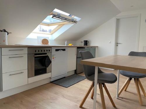 Ransbach-Baumbach Apartment | Luftige Dachwohnung mit besonderem Charme