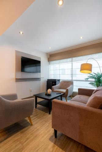 Armendariz Apartment | Lumiere 1BR by Geko