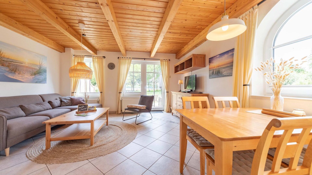 Tannenhausen House | Lüttje Huck vacation apartment 1 - with lake view & sauna