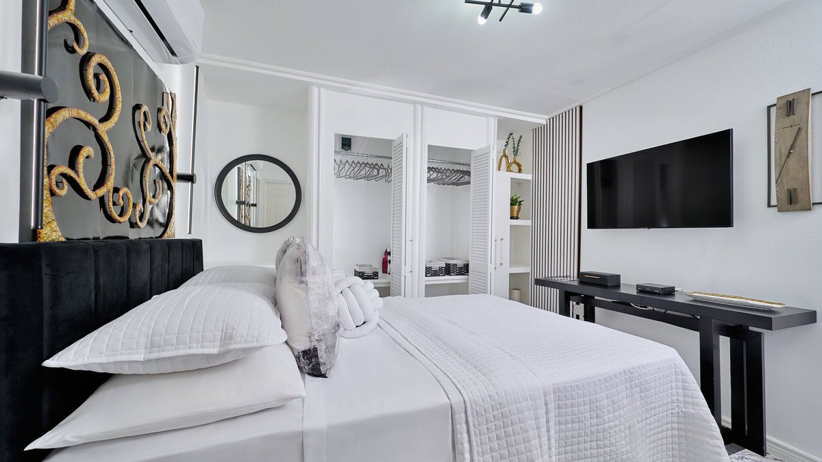 Kingstown Apartment | Luxurious 1 bedroom haven, modern kitchen moments from pristine black sand beach