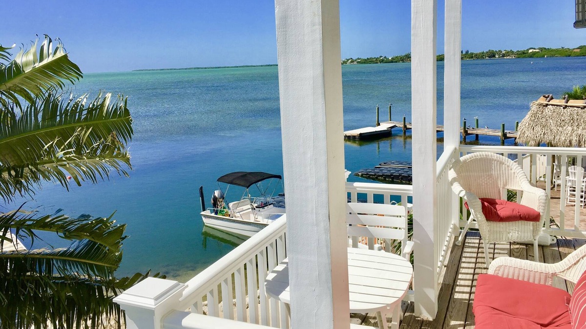 Cudjoe Key House | Luxurious Oceanfront Home on Beach, Dock, Heat/Cool Pool, Kayaks, Bikes, Views!