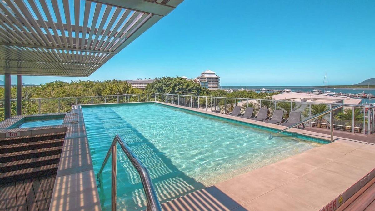 Cairns Central Business District Condo | Luxurious Waterfront Escape at Harbour Lights – Stunning Marina Views & Prime Location!