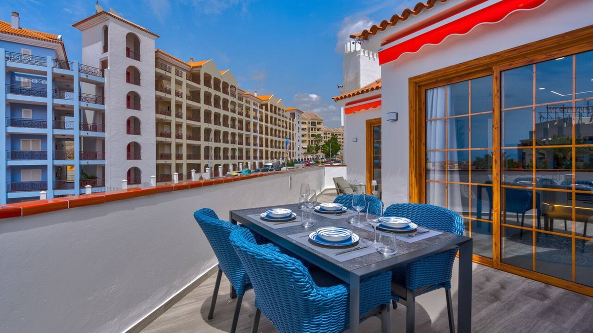 Los Cristianos Apartment | luxuriously renovated 2 bedroom, 2 bathroom, hugh terrace, heated pool and WIFI