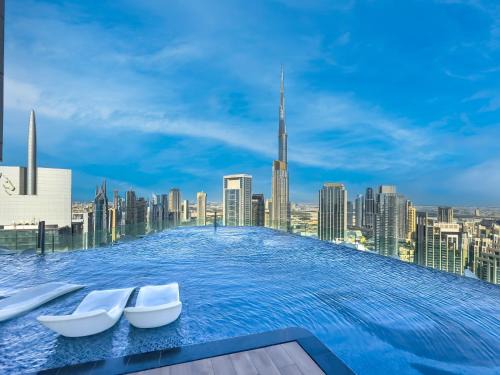 Downtown Dubai Apartment | Luxury Apartment at Paramount Midtown Hotel - Downtown Dubai - Full Burj Khalifa view - Highest infinity swimming pool