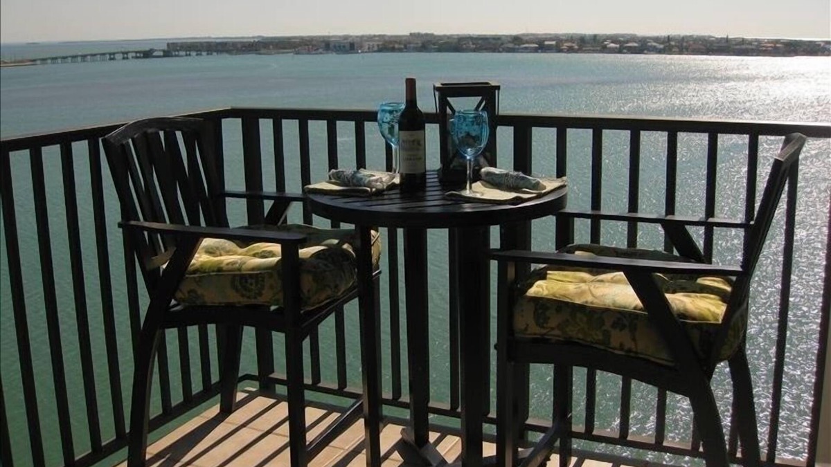 Isla del Sol Condo | LUXURY BAHIA POINTE WATERFRONT Condo/Panoramic Views! Dolphins, Manatee, More!