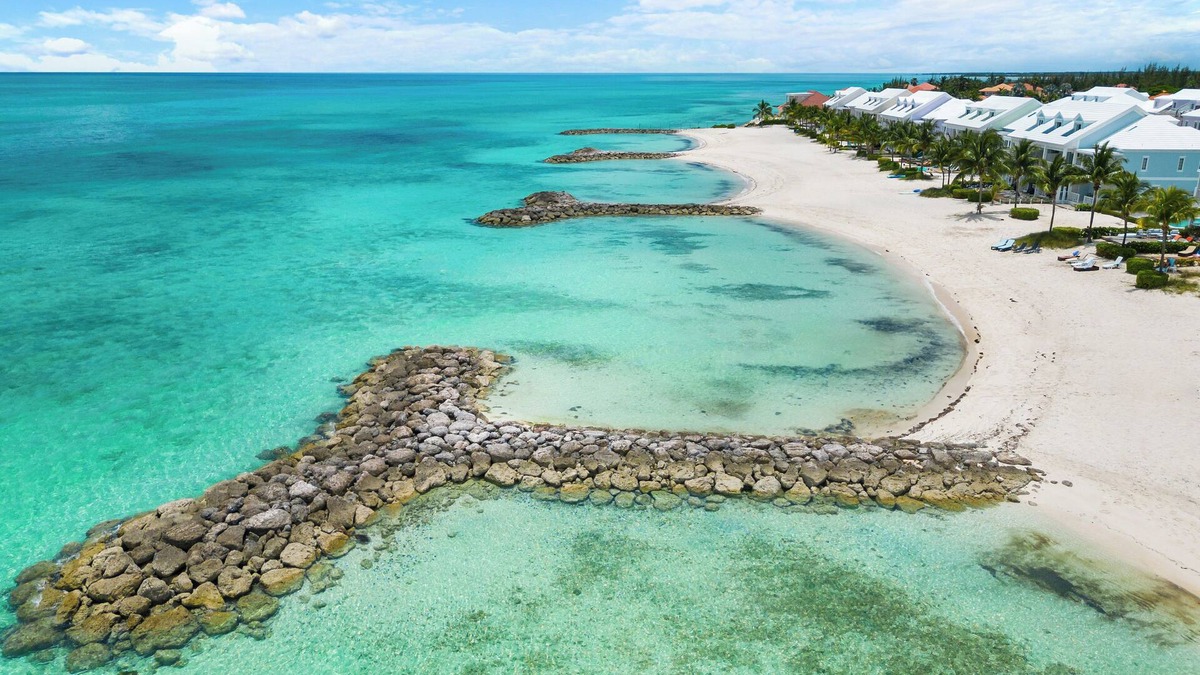 Palm Cay House | Luxury Beach side escape, steps from private beach, restaurant, marina, and café