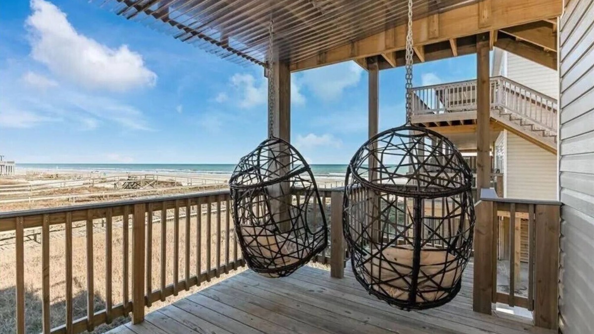 Surfside Beach Condo | Luxury Beachfront Condo with Covered Deck Steps From Beach & Golf Cart Rental