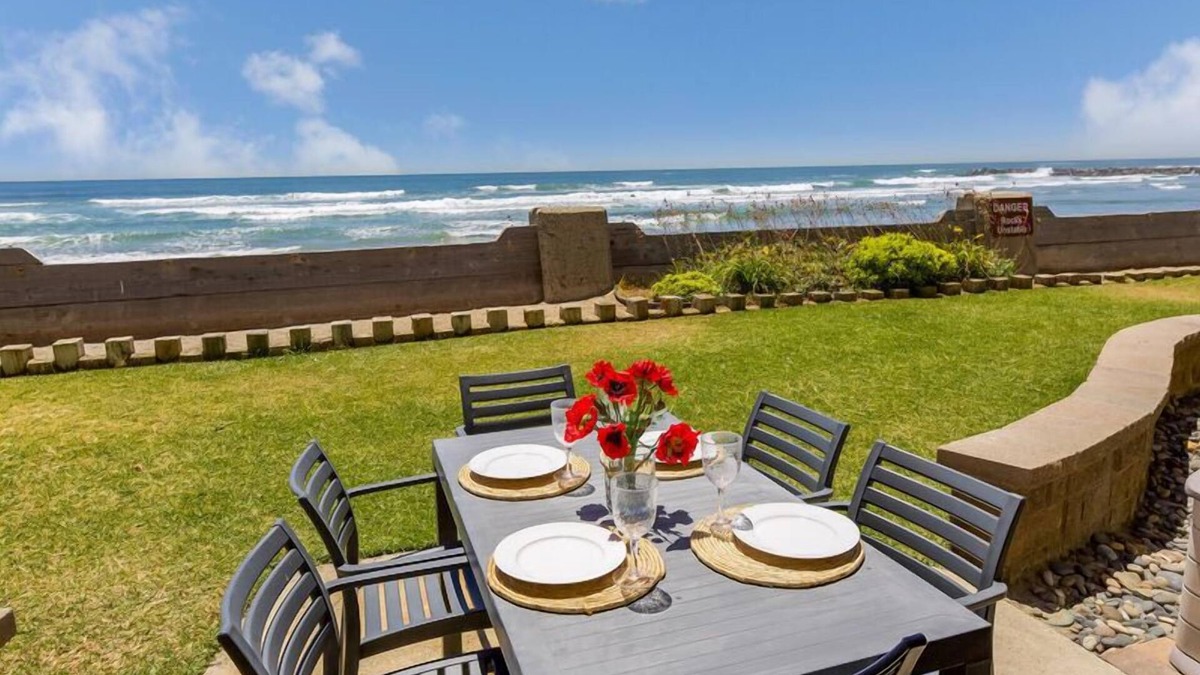 Oceanside Condo | Luxury Beachfront Lower Cottage, E17 North Coast Village