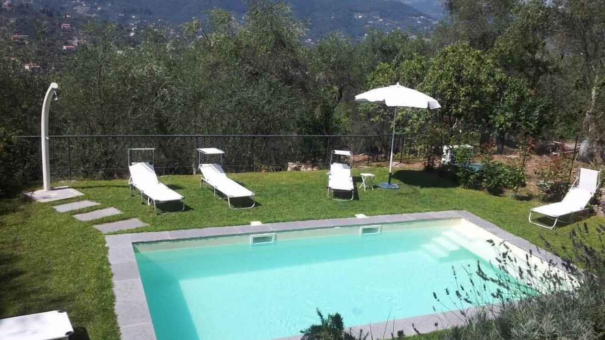 San Lorenzo della Costa Apartment | Luxury Apartment 2-4 persons in villa Liberty with olive trees and swimming pool, fine residential area above Santa Margherita Ligure