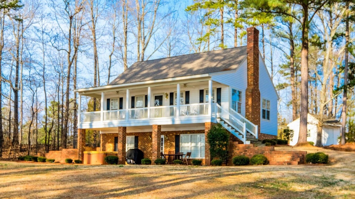 Henrico House | Luxury Lakefront Escape with Sunset Views, Private Boathouse, and Endless Fun!