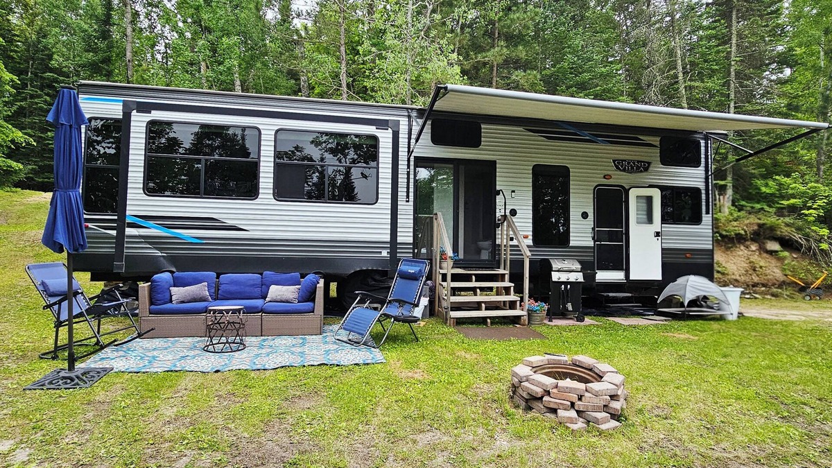 Waubun RV Rental | Luxury Lakefront Glamping near Itasca State Park + wifi, fit pit, & gas grill