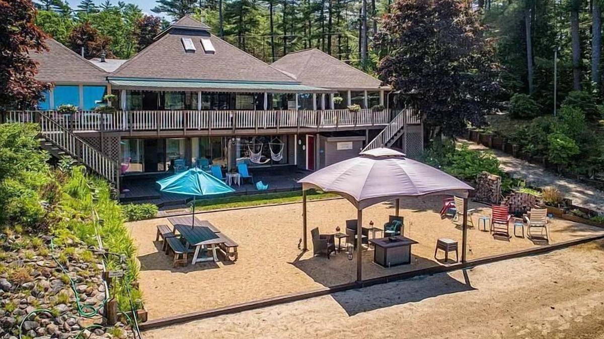 Milton House | Luxury Lakehouse with Large Private Beach, Hottub, Tiki Bar, 100’ Covered Deck, and Dock