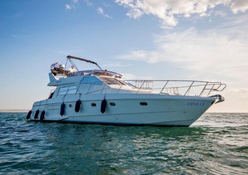 Ornos Boat Rental | Luxury Living on a Yacht
